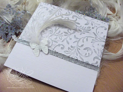 christmas invitation with butterflies an feathers