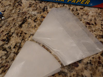 cut wax paper or parchment paper to fit pan