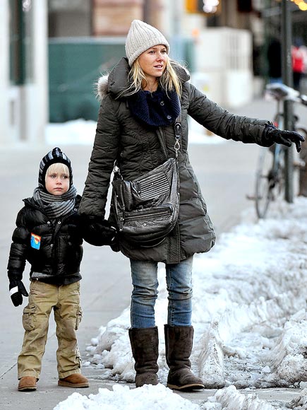 Naomi Watts and her son Sasha, 3, flag down a cab on Monday in New York City 