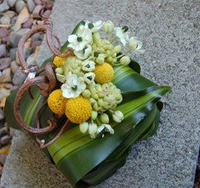 yellow and white ring pillow
