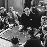 George Allison giving the Arsenal team a tactics talk