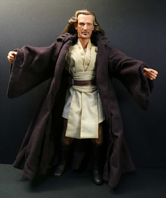 Qui-Gon with lightsaber