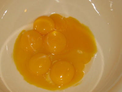 eggs yolk in a mixing bowl