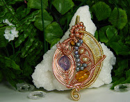WIRE WRAPPED HERRINGBONE PURPLE AND AMBER ICE FLAKE QUARTZ, TIGER EYE, PEARLS AND COPPER PENDANT