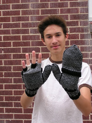 boy with mittens on