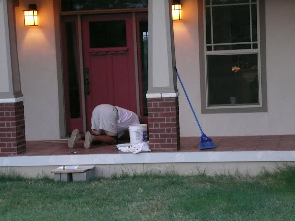 Bob tiling the front porch