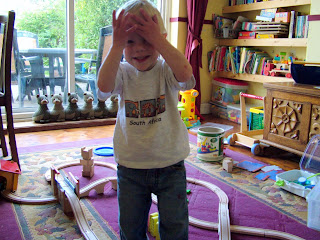Hiding from Mum by our enormous train layout