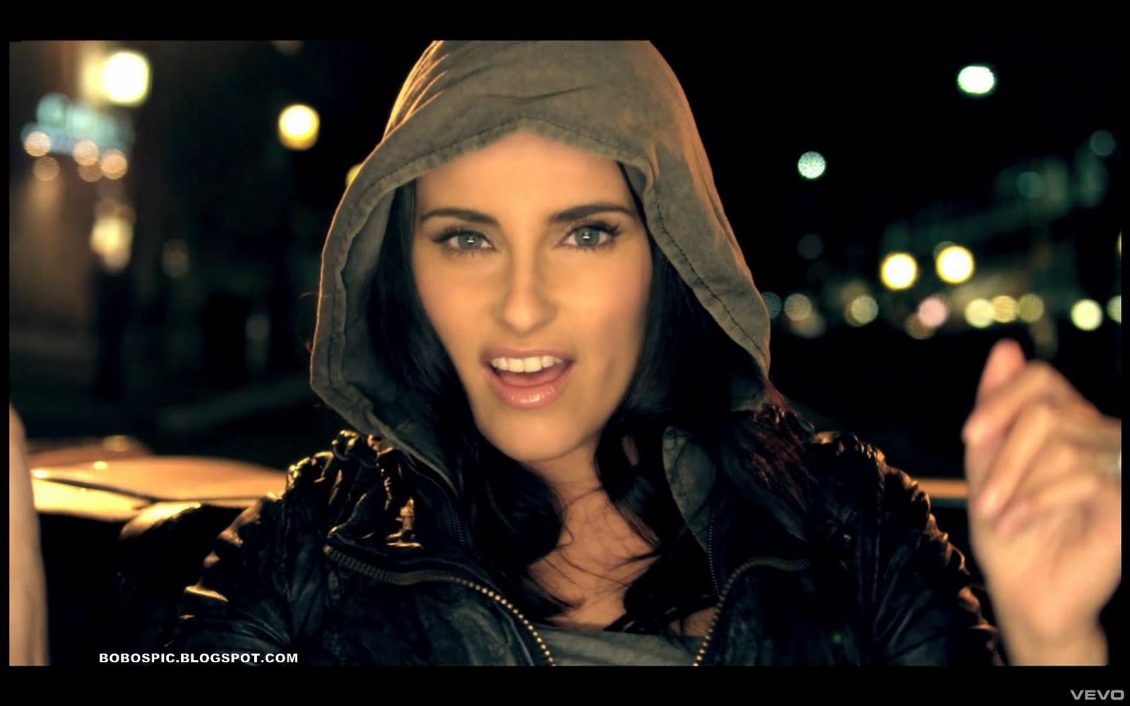 Music Video Pics: Nelly Furtado - Night Is Young video pictures1600 x 1000