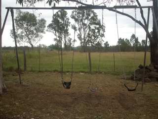 [playground+swings24.JPG]