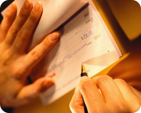 [cheque-signing-picture.jpg]