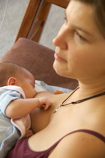 Women+breastfeeding+pets