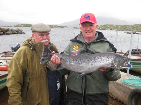 On the left, Heinz Strappman with his new record in lough Currane for sea trout