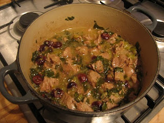 slow-cooked lamb with spring onions, cherries and lemon