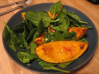 roast squash, chilli and spinach salad with peanut and ginger dressing