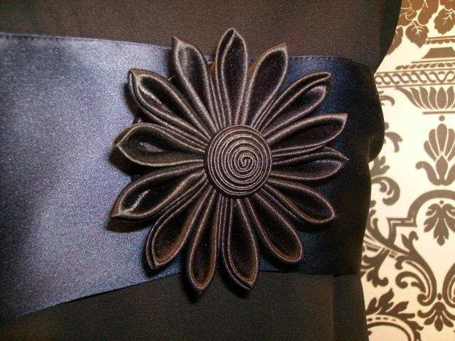 This Wig In A Traditional Japanese Hairstyle Is Black With A Small Ponytail Kanzashi are ornaments used in traditional Japanese hairstyles. This Wig In A Traditional Japanese Hairstyle Is Black With A Small Ponytail Kanzashi are ornaments used in traditional Japanese hairstyles.