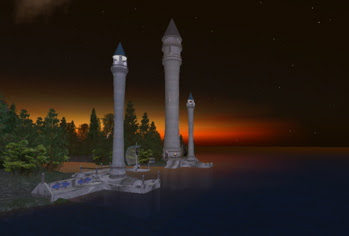 elven towers shilouetted against the sunset