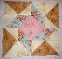 whirligig1 block from The Graceful Garden Jacobean Quilt