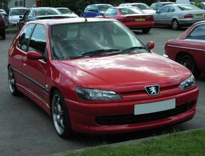 Peugeot 306 Car picture description: A red 306 Peugeot car. Peugeot 306 Car picture description: A red 306 Peugeot car.