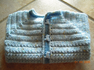 Schema maglioncino neonato ferri