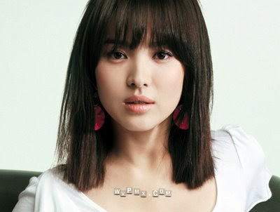 4) Mid-length Japanese permed hairstyle with short bangs sweep to the side