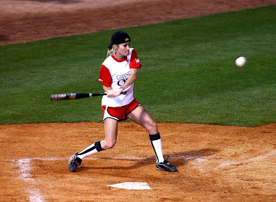 Carrie Underwood at the 19th Annual City of Hope Celebrity Softball Challenge shagging some balls and swinging for the fences