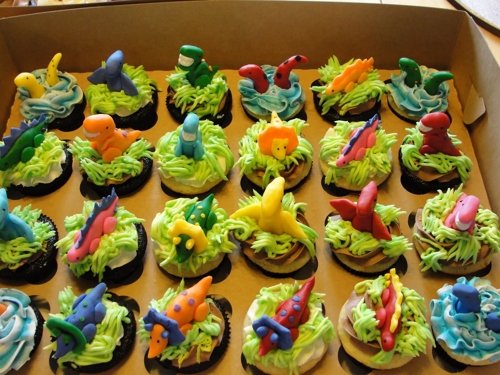 Oh, just put a cupcake in it....: Dinosaurs and volcanoes....