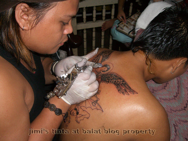 Here are some of his actual tattooing and piercing: title=