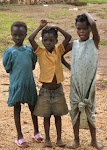 Esmée in blue with friends before coming to orphanage