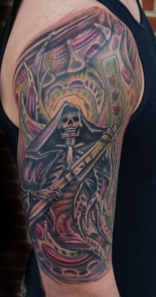 Source url:http://www.greattattoos.net/2010/08/grim-reaper-tattoo-grim- 