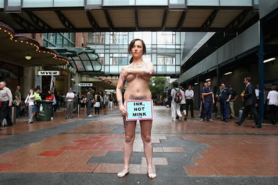 Tattooed Model Stands For PETA Protest