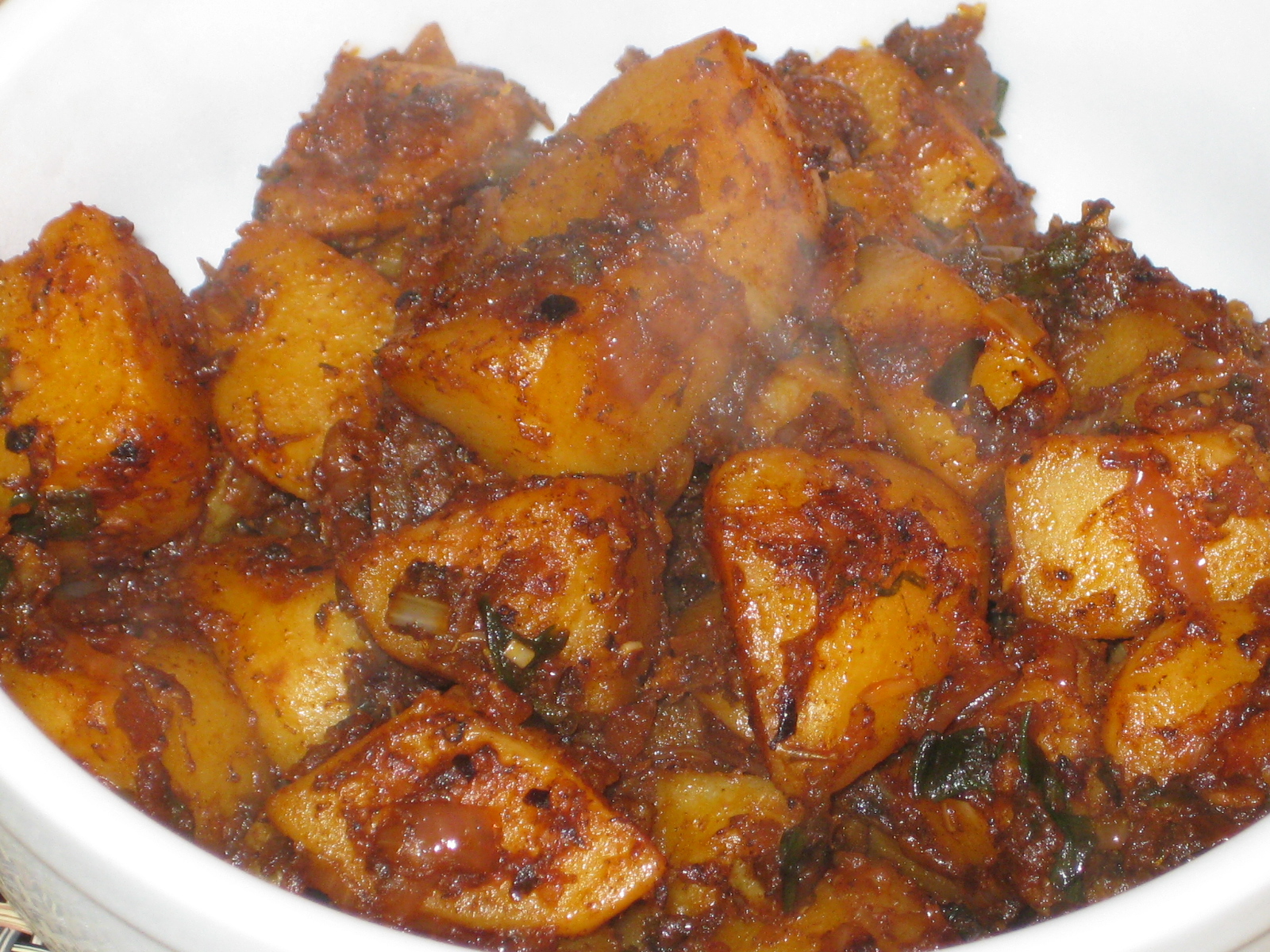 cooking Homefried potatoes with a paprikaonion sauce