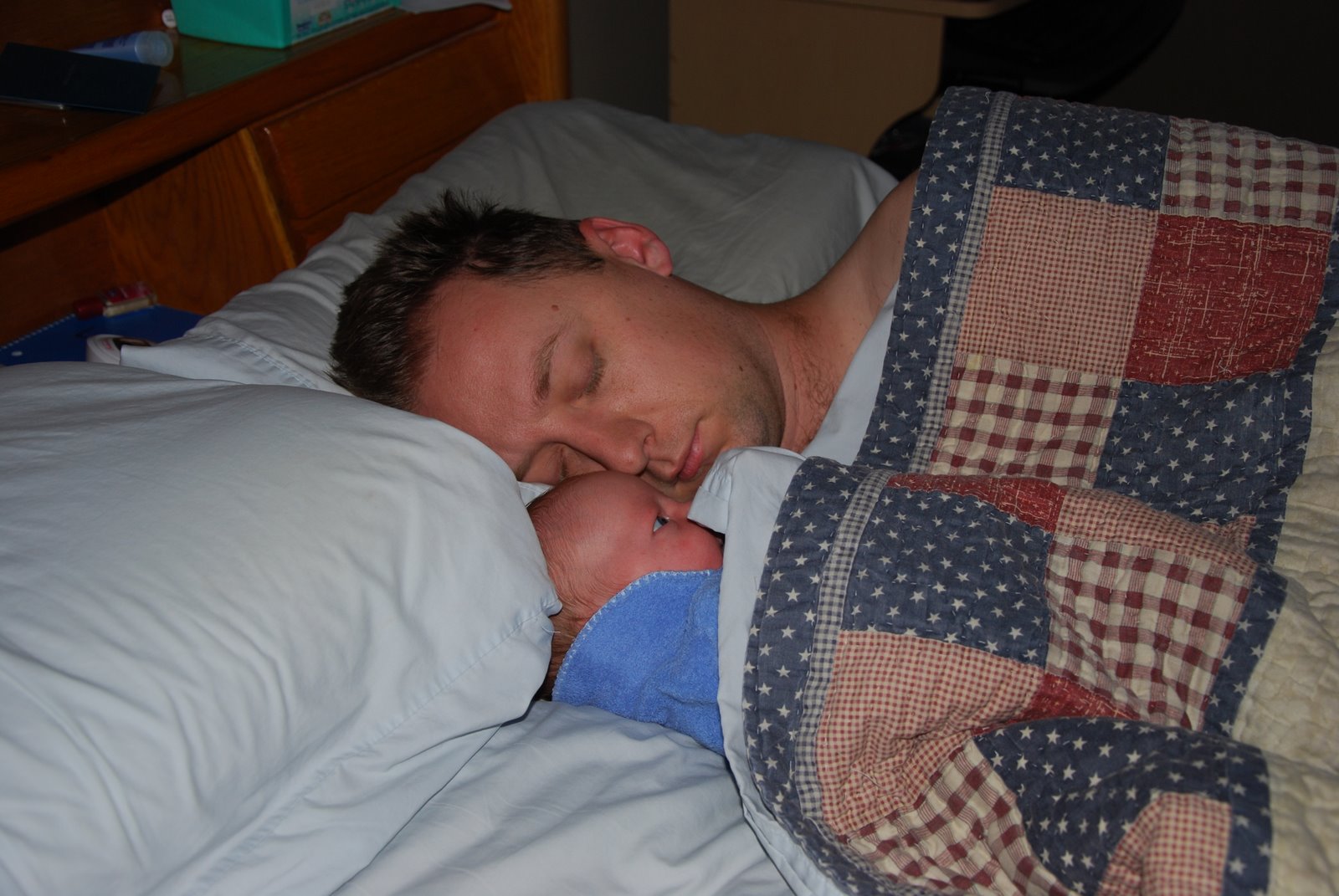 Daddy sleeping here with Luke Samuel.