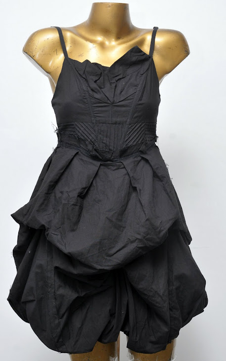 Vestido negro globo $12.000
