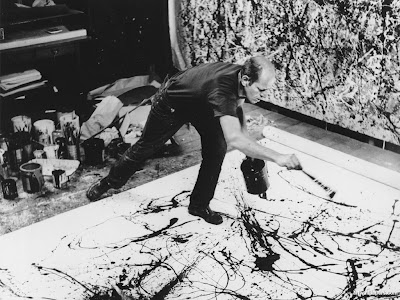 Pollock Jackson. throwing paint. high angle. cropped