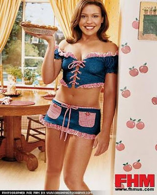 Rachael Ray Racy Photos: Hottest Photoshoot, Image Gallery:Hopefully the demented editor who cast Rachel ray in FHM's 2003 “sexy” photoshoot