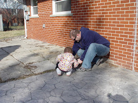 daddy and Lainey pulling weeds