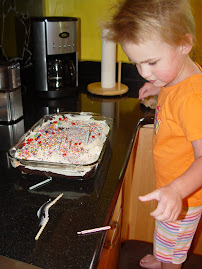 Elaine baking Grandma T a cake
