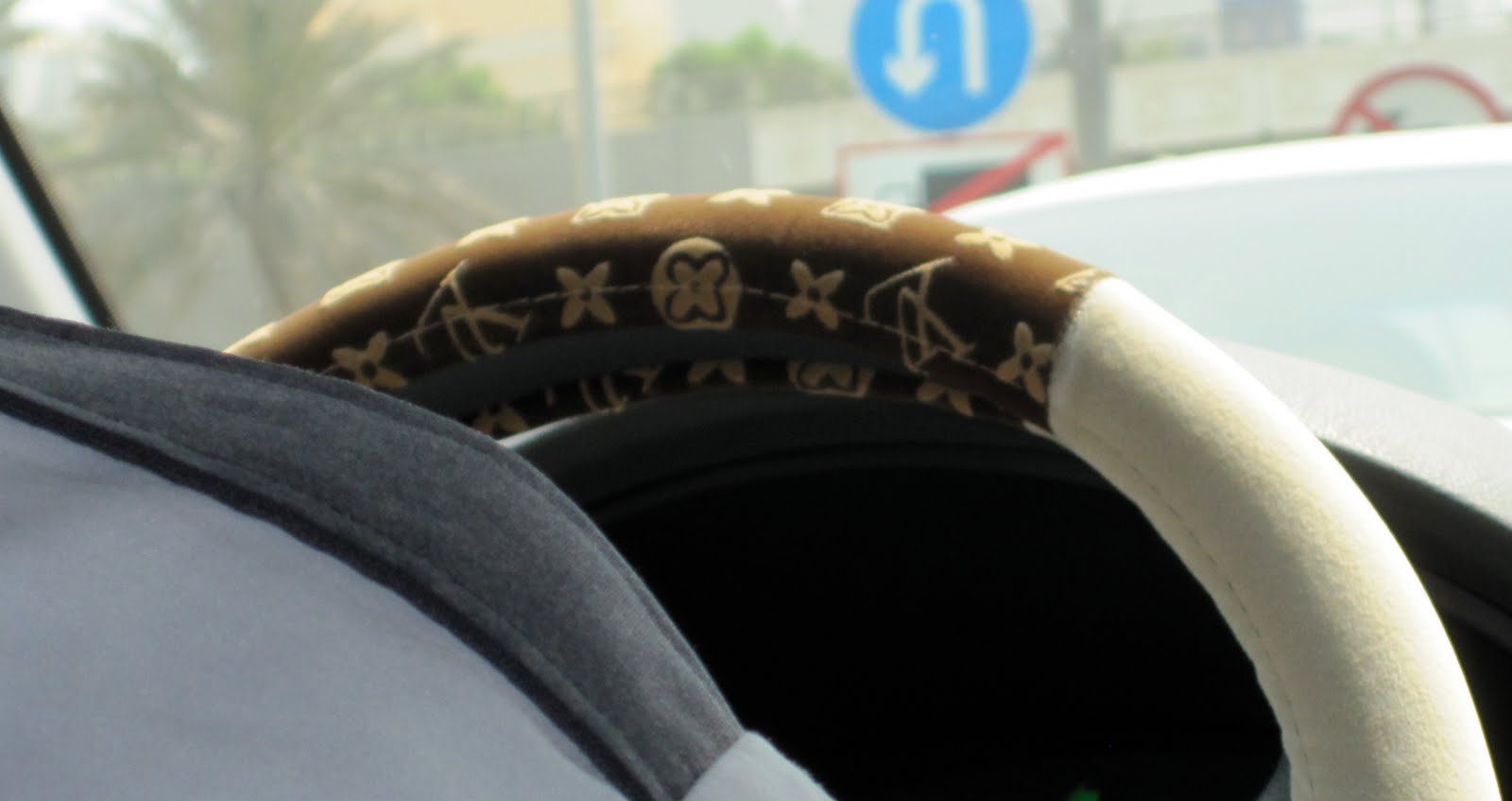 A Canadian in Abu Dhabi, UAE: Cab sports velour Louis Vuitton steering  wheel cover