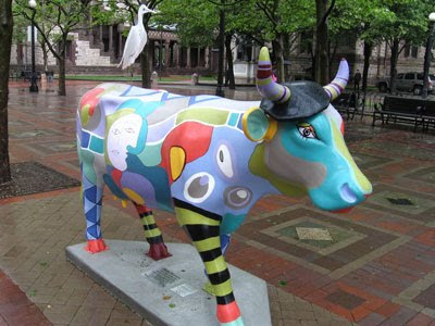 This+Pablo+Picowso+statue,+wearing+a+beret+and+hosting+a+bird+on+its+back,+is+part+of+the+Cow+Parade+that+is+currently+on+display+in+Boston,+Massachusetts.bmp