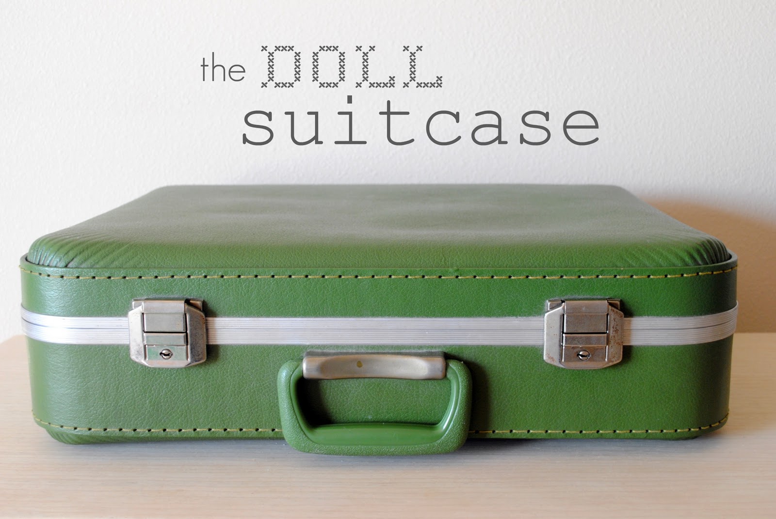 doll in a suitcase