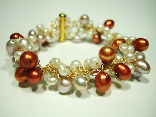 #GSBB467 - CROCHET PEARLS White / Gold Color Bracelet ~ Created with no other beads but only Fresh water Pearls in 3 different colors. Using the Single crochet technique in combining 28 gauge Non tarnish Gold Artistic Beading wires and Fresh water pearls in natural White, Gold & Lavender Shades . Measures about 7 to 7-1/2 inches lenght. Secured with Gold Plated Slide Clasp ~ Price = US$36.75 (S50)