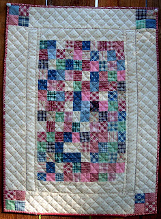 Quilt in Pink made of Squares