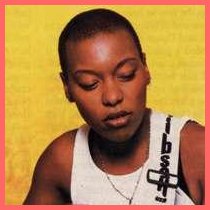 MeShell NdegeOcello with a shaved head