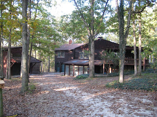 view of house and garage after trees were trimmed - the top of the garage is what I call The Loft, where my embroidery business is