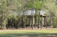 The picnic shelter next to the parking area as viewed from the trail head.