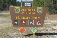 Sign along Highway 20 in front of the Fort Braden Trails. photo of sign