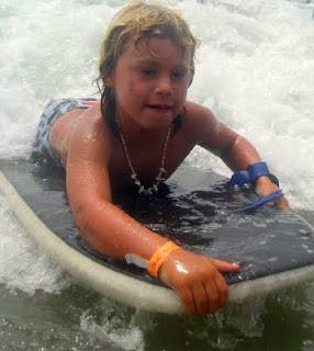 Boogie boarding at Aloha Beach Camp summer camp in Malibu, Los Angeles, California