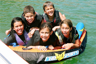 Kids getting ready for tubing, wakeboarding and jet skiing summer camp activities at Aloha Beach Camp in Los Angeles.