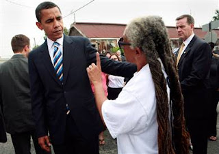 Obama and a moonbat supporter. Love the hair, don't you?