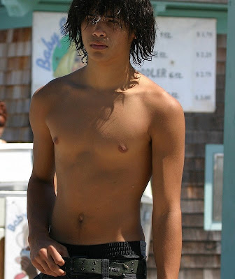 Shirtless teenage boy